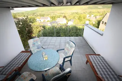 Ein Balkon oder eine Terrasse in der Unterkunft Moseltraum Alte Schmiede