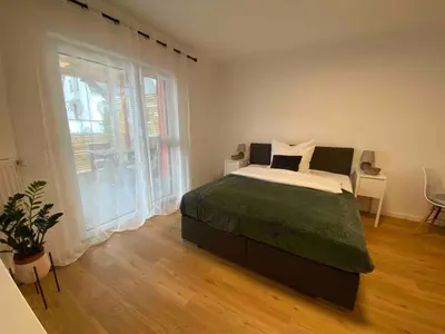 Ein Bett oder Betten in einem Zimmer der Unterkunft Zwischen Mosel und Weinbergen