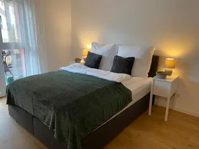 Ein Bett oder Betten in einem Zimmer der Unterkunft Zwischen Mosel und Weinbergen