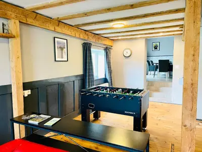 Eine Spielezimmer in der Unterkunft Ferienwohnung PickUp