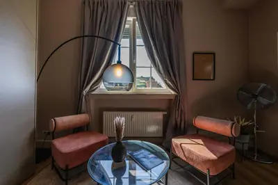 Ein Sitzbereich in der Unterkunft LLR Design Apartment - Loft Grey