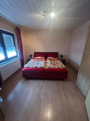 Ein Bett oder Betten in einem Zimmer der Unterkunft Apartment in Neuwied