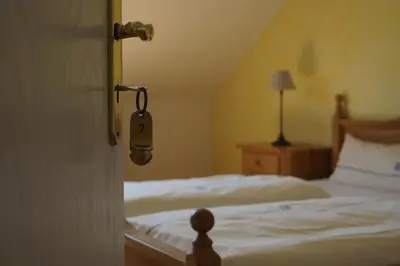 Ein Bett oder Betten in einem Zimmer der Unterkunft Gästehaus Classisches Weingut Hoffranzen