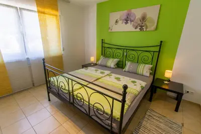 Ein Bett oder Betten in einem Zimmer der Unterkunft Weingut Roth