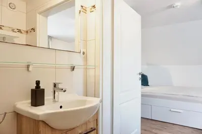 Ein Badezimmer in der Unterkunft Stylisches Apartment für 2 Personen in historischem Fachwerkhaus 4 Etage mit Blick auf Stadt & Festung