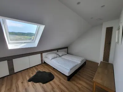 Ein Bett oder Betten in einem Zimmer der Unterkunft Moselluft2