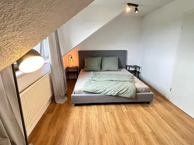 Ein Bett oder Betten in einem Zimmer der Unterkunft Modern Wohnung in der Nähe von Koblenz
