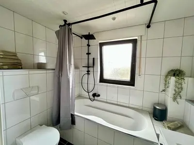Ein Badezimmer in der Unterkunft Modern Wohnung in der Nähe von Koblenz