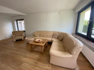 Ein Sitzbereich in der Unterkunft Apartment in Adenau