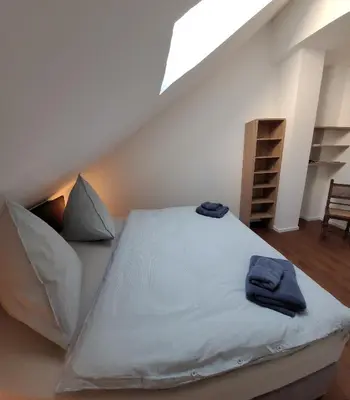Ein Bett oder Betten in einem Zimmer der Unterkunft Scheune Am alten Posthof Lieser