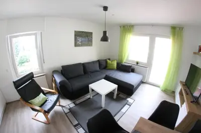 Ein Sitzbereich in der Unterkunft Ferienwohnungen und Appartements - Haus Budinger