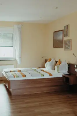 Ein Bett oder Betten in einem Zimmer der Unterkunft Weingut Später-Veit