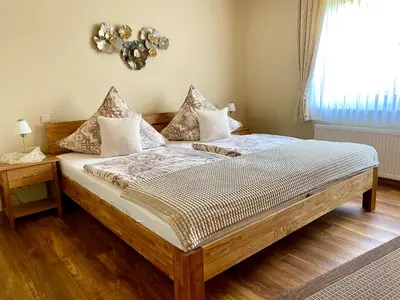 Ein Bett oder Betten in einem Zimmer der Unterkunft Zwei gepflegte Gästezimmer mit eigenem Bad