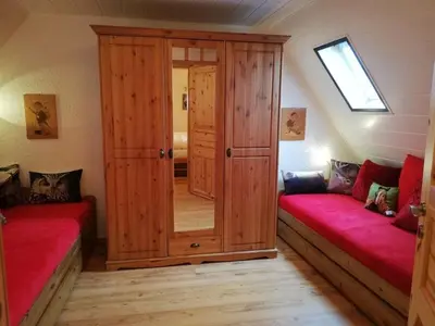 Ein Bett oder Betten in einem Zimmer der Unterkunft Ferienhaus Koppenstein