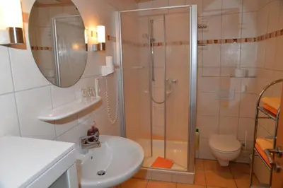 Ein Badezimmer in der Unterkunft Pension Basten