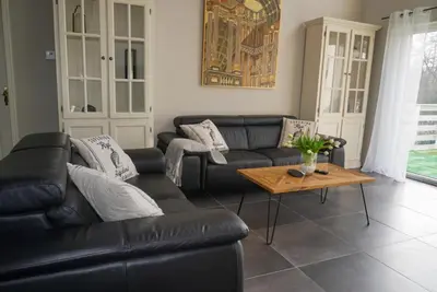 Ein Sitzbereich in der Unterkunft Ferienwohnung mit Sauna und Pool