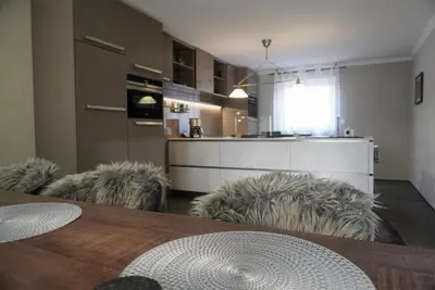 Küche/Küchenzeile in der Unterkunft Ferienwohnung mit Sauna und Pool