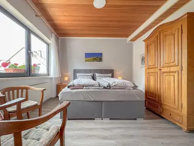 Ein Bett oder Betten in einem Zimmer der Unterkunft Hermes-Lex Weingut