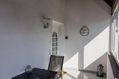 Ein Sitzbereich in der Unterkunft Ferienwohnung Moselurlaub Winningen