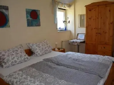 Ein Bett oder Betten in einem Zimmer der Unterkunft Trappen