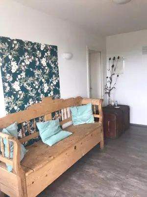 Ein Bett oder Betten in einem Zimmer der Unterkunft GUTE ZEIT Ferienwohnung