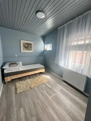 Ein Bett oder Betten in einem Zimmer der Unterkunft Ganzes Haus für 4 in Kestert