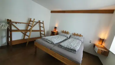 Ein Bett oder Betten in einem Zimmer der Unterkunft Am Gäsbach EG