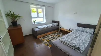 Ein Bett oder Betten in einem Zimmer der Unterkunft Am Gäsbach EG