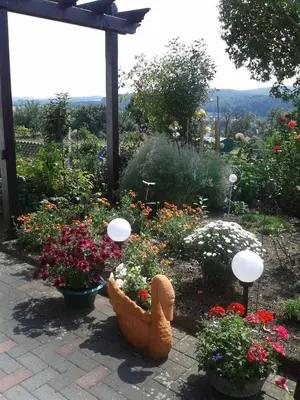 Ein Garten an der Unterkunft Ferienwohnung Fülbier