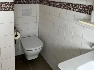 Ein Badezimmer in der Unterkunft Ferienparadies an der Utzig Quelle