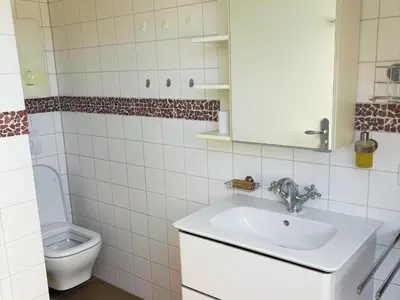 Ein Badezimmer in der Unterkunft Ferienparadies an der Utzig Quelle