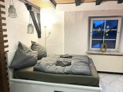 Ein Bett oder Betten in einem Zimmer der Unterkunft Traumhaus mit mega top specials