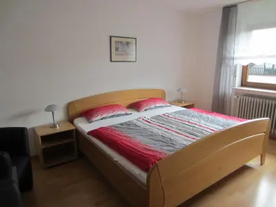 Ein Bett oder Betten in einem Zimmer der Unterkunft Weingut Arnold Pauly