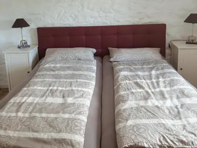 Ein Bett oder Betten in einem Zimmer der Unterkunft Ferienparadies in der Vulkaneifel