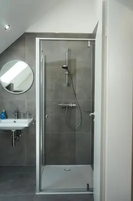 Ein Badezimmer in der Unterkunft Hain Estate Appartements