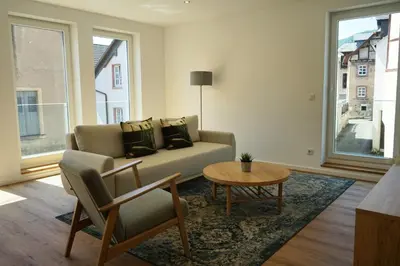 Ein Sitzbereich in der Unterkunft Hain Estate Appartements