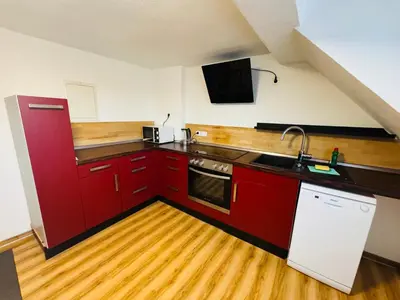 Küche/Küchenzeile in der Unterkunft Balkonwohnung in Moselnähe