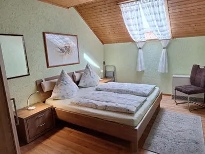 Ein Bett oder Betten in einem Zimmer der Unterkunft Ferienhaus 