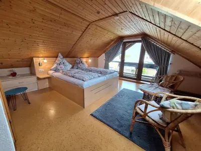 Ein Bett oder Betten in einem Zimmer der Unterkunft Ferienhaus 