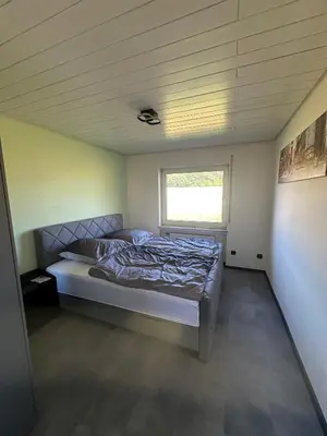 Ein Bett oder Betten in einem Zimmer der Unterkunft Ferienhaus Hof Schöneck in sehr ruhiger Alleinlage