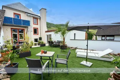 Ein Garten an der Unterkunft Bambuszimmer mit großem Dachgarten im Gästehaus Graf-Schmelzer