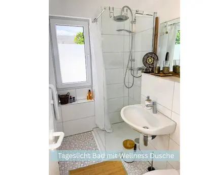 Ein Badezimmer in der Unterkunft Bambuszimmer mit großem Dachgarten im Gästehaus Graf-Schmelzer