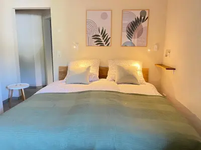 Ein Bett oder Betten in einem Zimmer der Unterkunft Ferienwohnung Zeitwinkel
