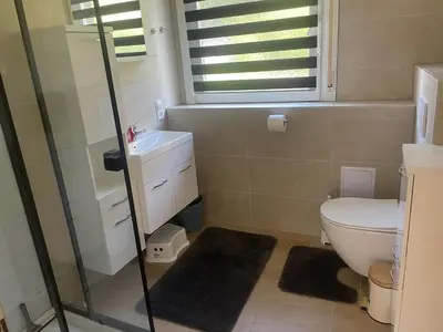 Ein Badezimmer in der Unterkunft Holunder nah am Waldsee 3