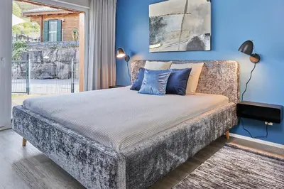 Ein Bett oder Betten in einem Zimmer der Unterkunft Ferienwohnung Mila EG