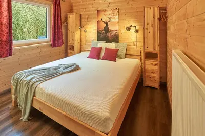 Ein Bett oder Betten in einem Zimmer der Unterkunft Ferienhaus Seepfadhäusle