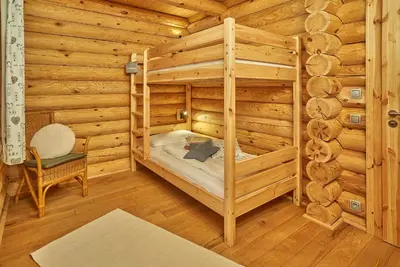 Ein Bett oder Betten in einem Zimmer der Unterkunft Seezeit Chalet