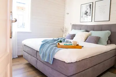 Ein Bett oder Betten in einem Zimmer der Unterkunft Ferienhaus Kleine Auszeit