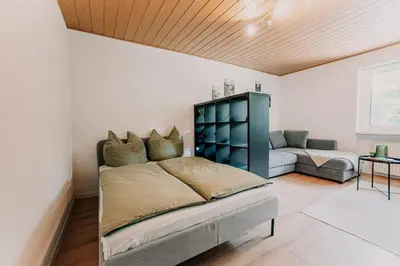 Ein Bett oder Betten in einem Zimmer der Unterkunft Ferienwohnung - Zur Waldruhe