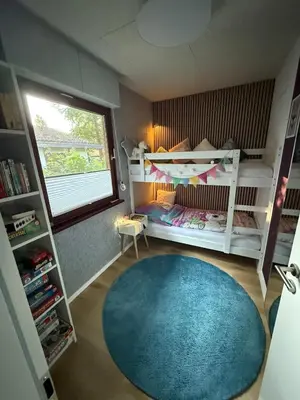 Ein Bett oder Betten in einem Zimmer der Unterkunft Blockhütte im Wald in der Eifel